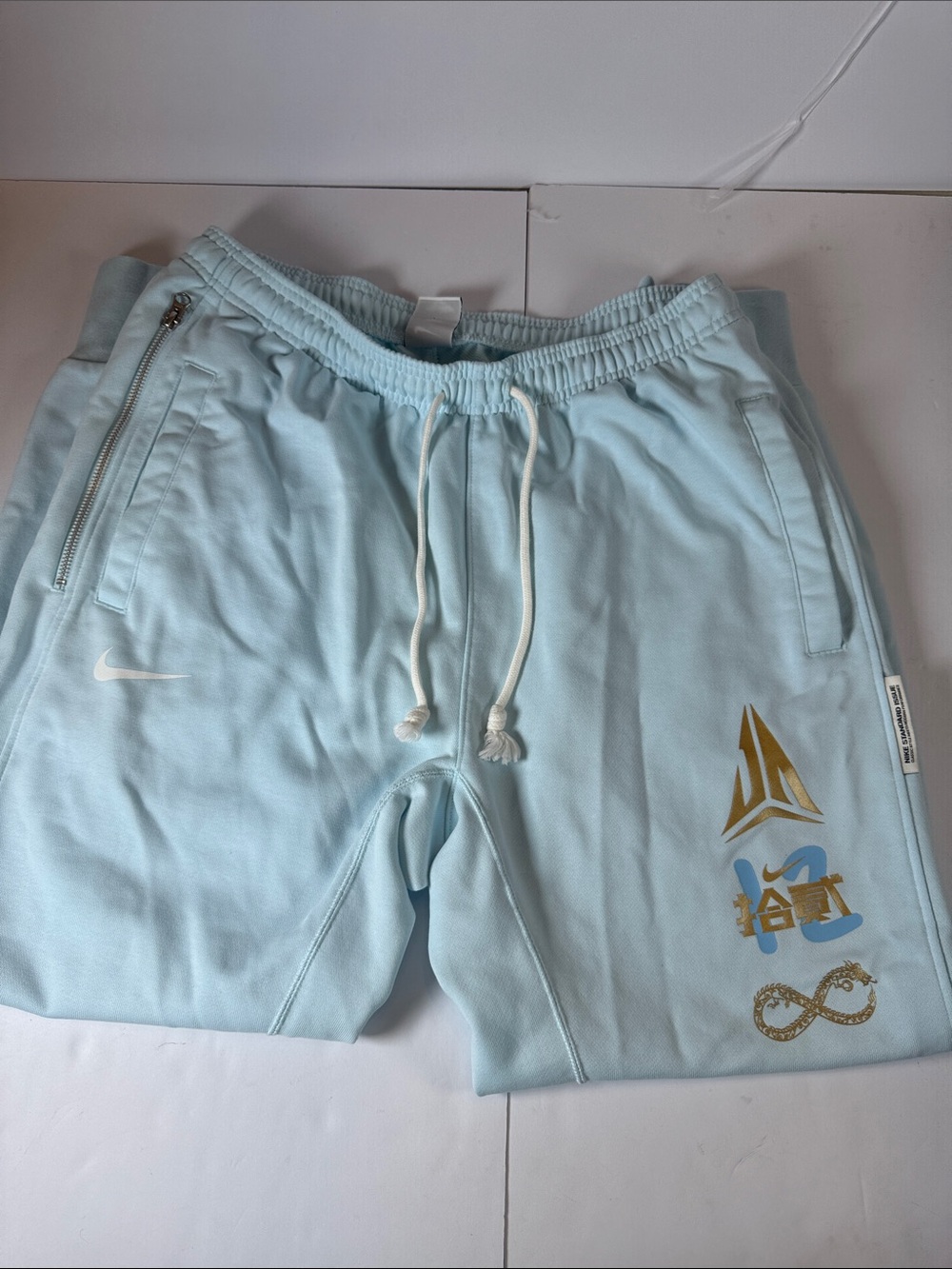 Nike Light Blue Graphic Drawstring joggers